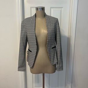 Brand new w/ tags woman’s size small black and white blazer